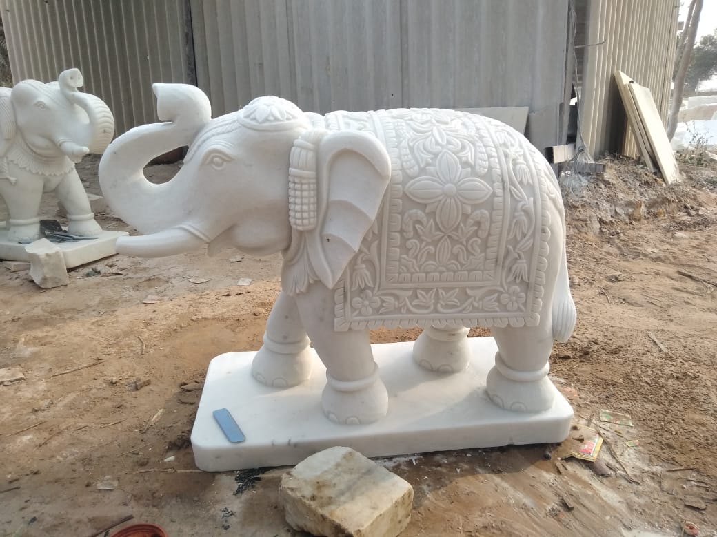 Elephant statue in white marble 